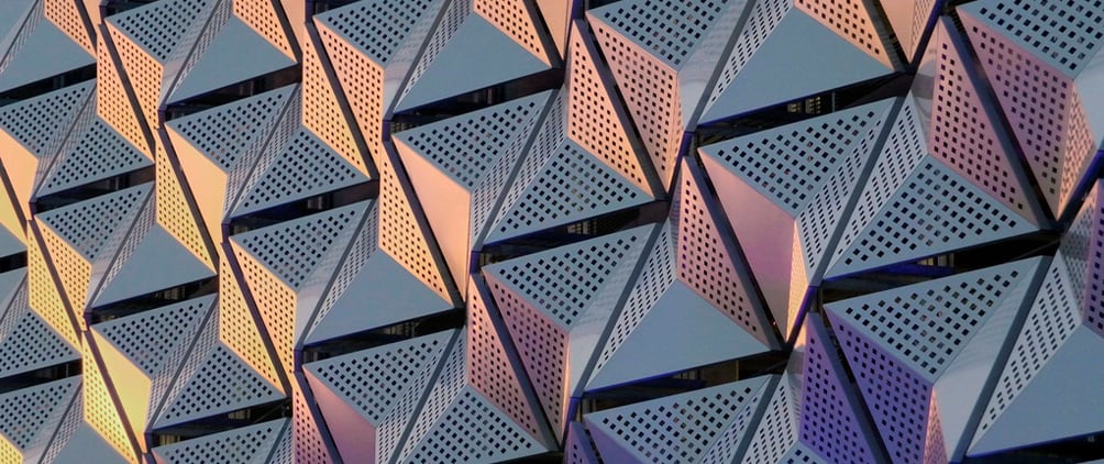Geometric architectural pattern representing emerging frontiers, private fixed income, portfolio resilience and insurance investment strategy.