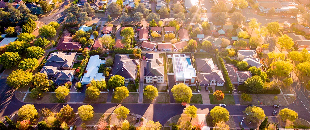 Aerial neighborhood view representing Bayview Asset Management’s guide to residential mortgage loan investing structures for insurance investors.