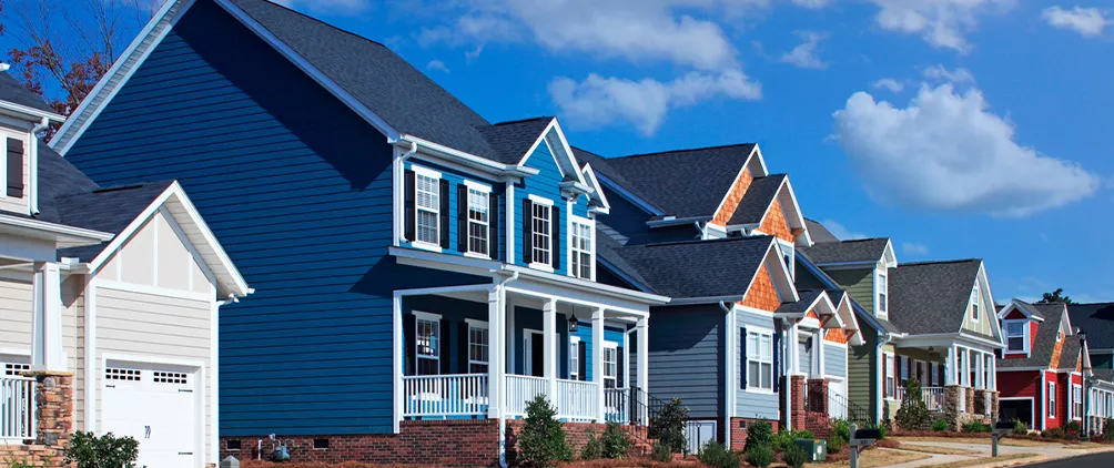 Residential neighborhood homes representing MetLife Investment Management’s May 2026 U.S. housing market outlook.