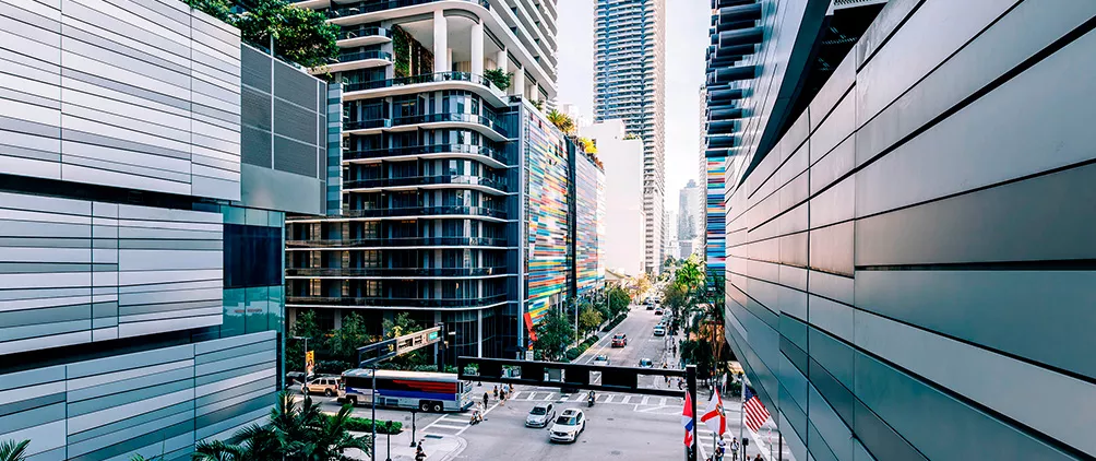 Modern city street lined with high-rise buildings
